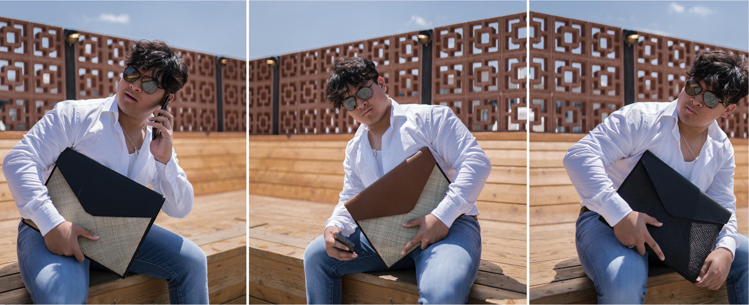 Image of men holding a woven laptop/ tablet sleeves 